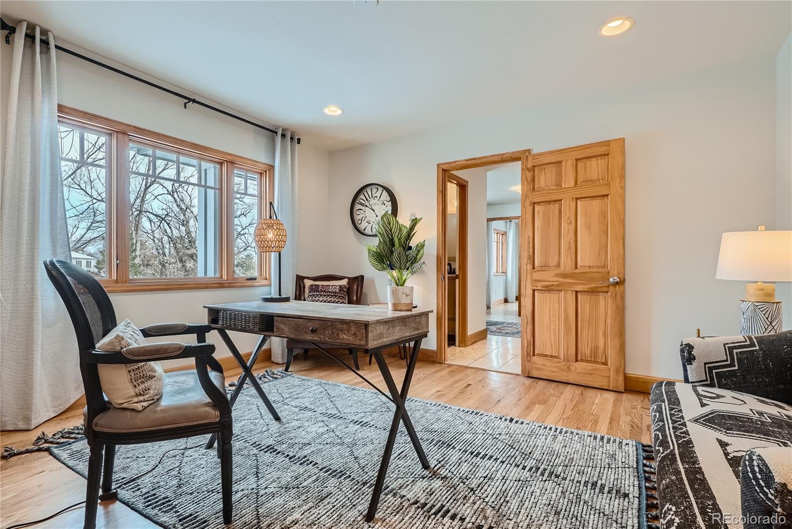 205 Fair Place Boulder, CO 80302 - Photo 6 of 46 a workspace with wooden floor and a window