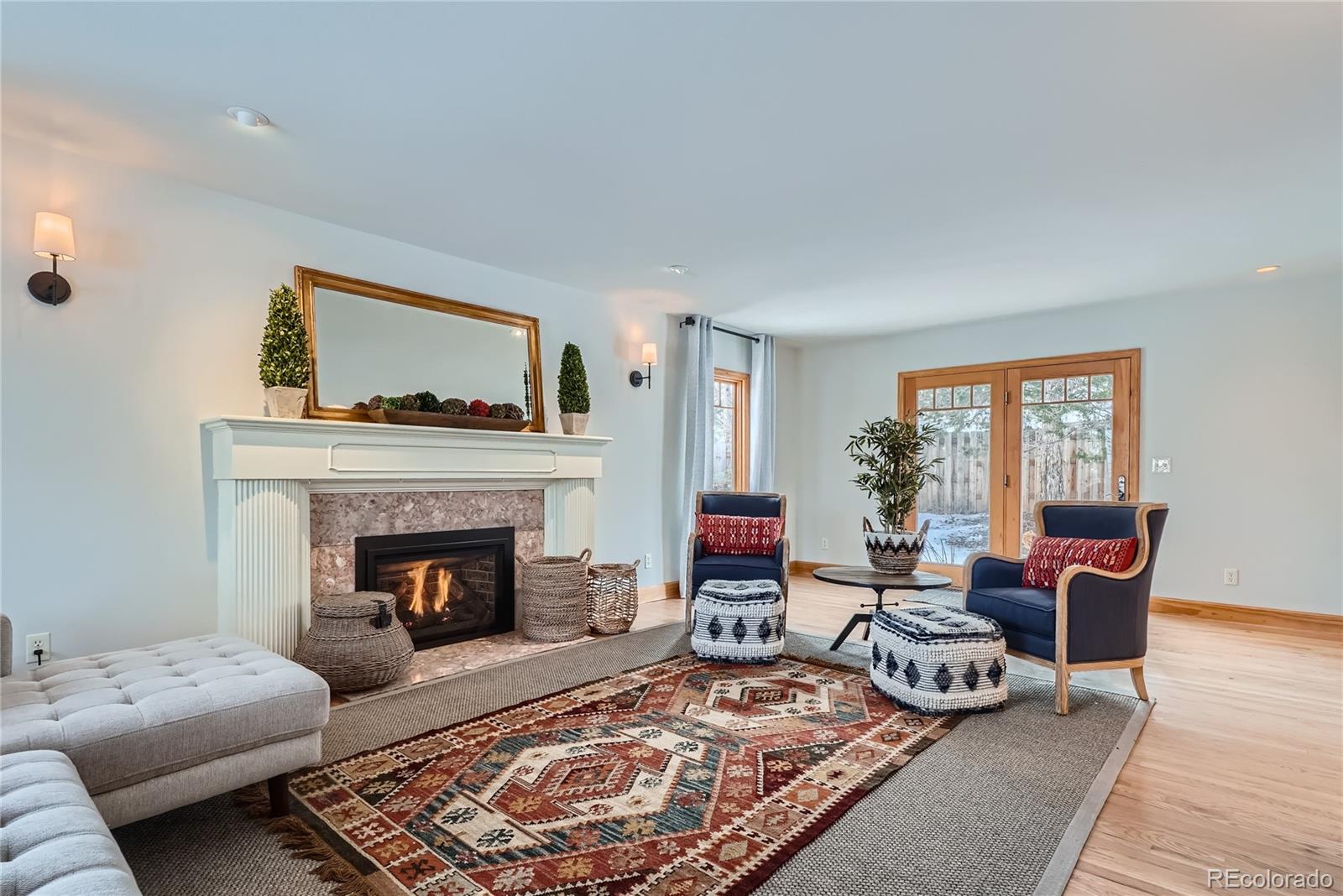 205 Fair Place Boulder, CO 80302 - Photo 7 of 46 a living room with furniture and a fireplace