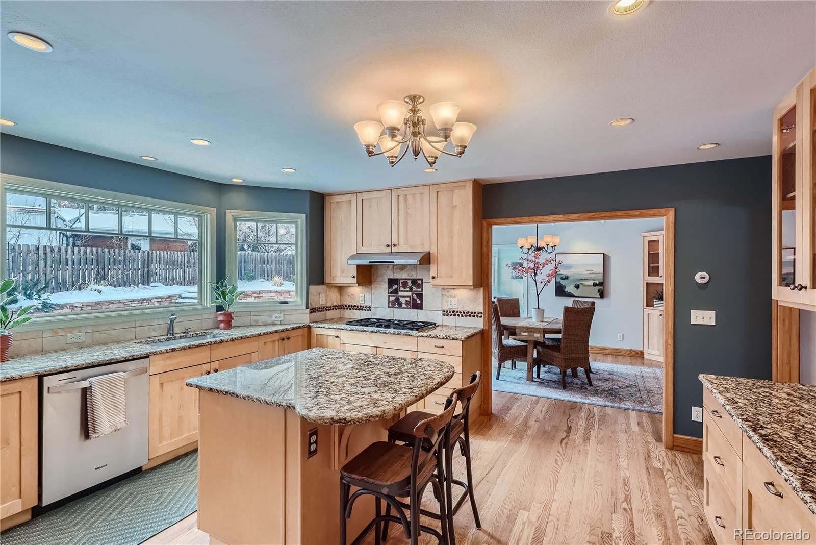 205 Fair Place Boulder, CO 80302 - Photo 9 of 46 a view of a dining room with furniture window and wooden floor