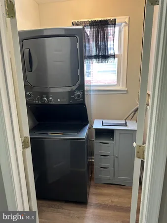 a view of a hallway with a chandelier