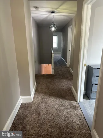 a view of a window in an empty room