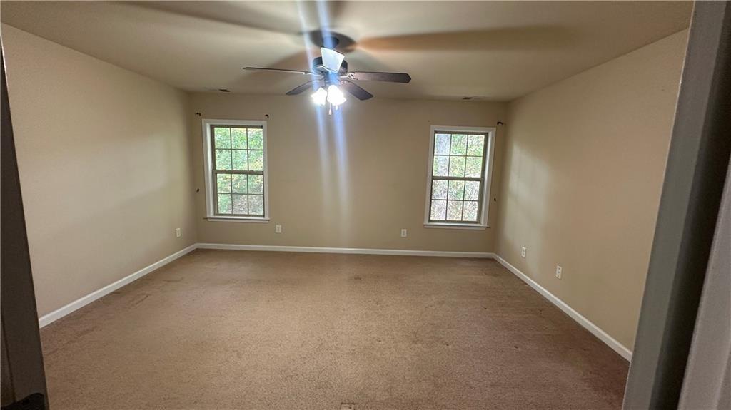 115 Tyson Woods Road Acworth, GA 30102 - Photo 14 of 23 an empty room that has a window