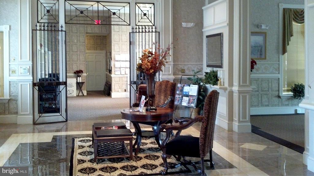 1530 Spring Gate Dr., Unit 9103 McLean, VA 22102 - Photo 23 of 30 a dining room with furniture and window