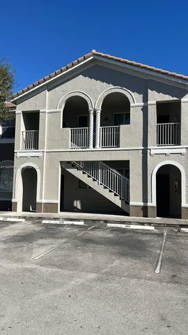 a front view of a house with a garage