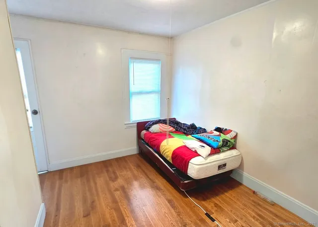 a room with toys and wooden floor