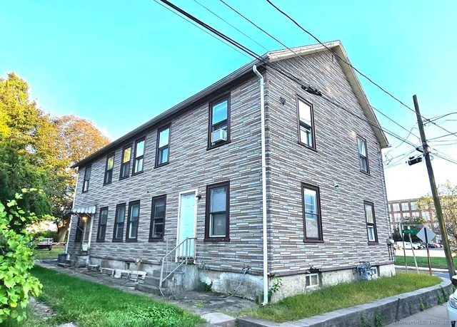 a front view of house with yard