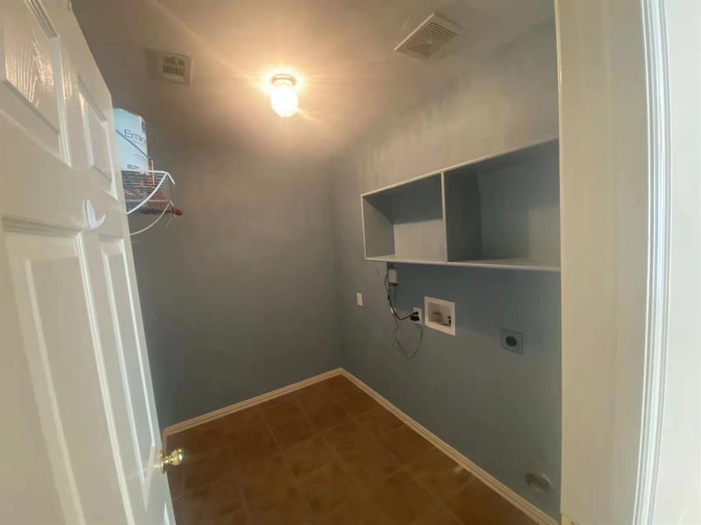 2363 Stuttgart Drive Frisco, TX 75033 - Photo 12 of 14 a view of storage and utility room with empty racks