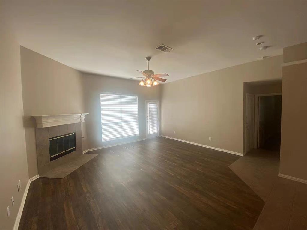 2363 Stuttgart Drive Frisco, TX 75033 - Photo 3 of 14 a view of livingroom window fireplace