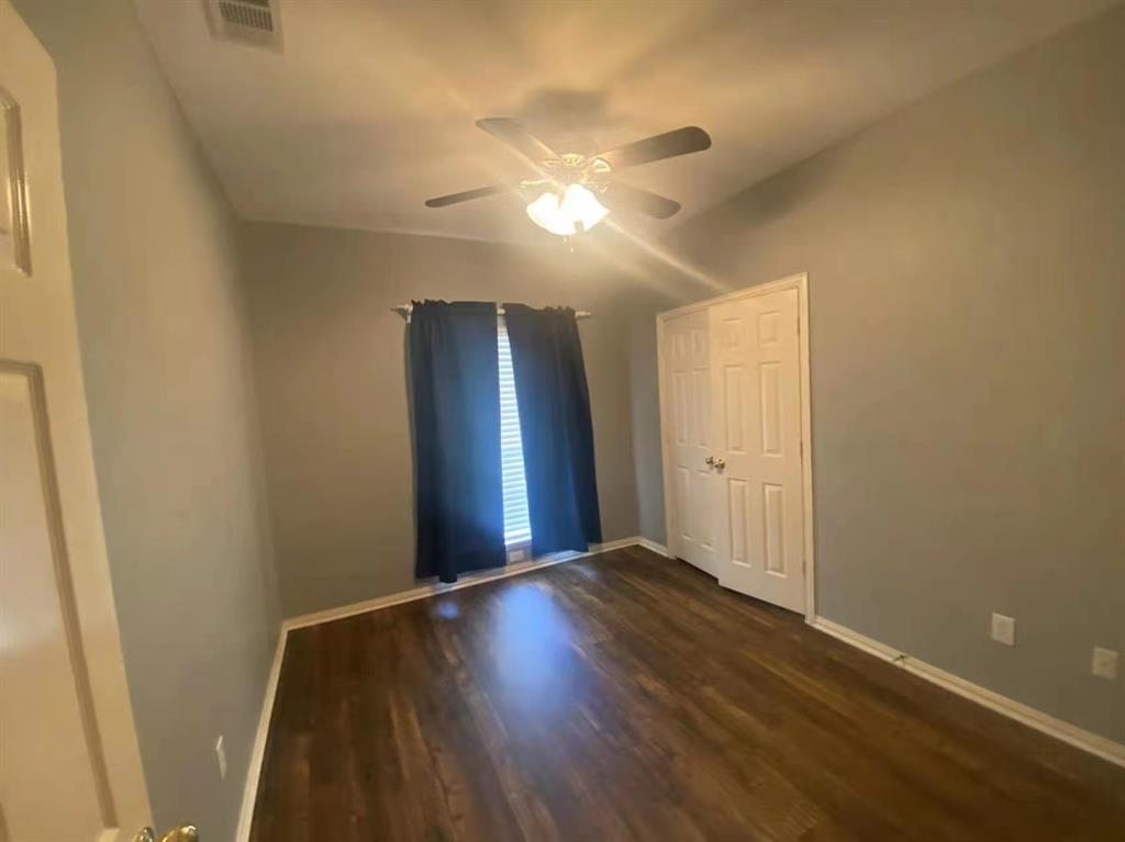 2363 Stuttgart Drive Frisco, TX 75033 - Photo 10 of 14 a view of an empty room with wooden floor
