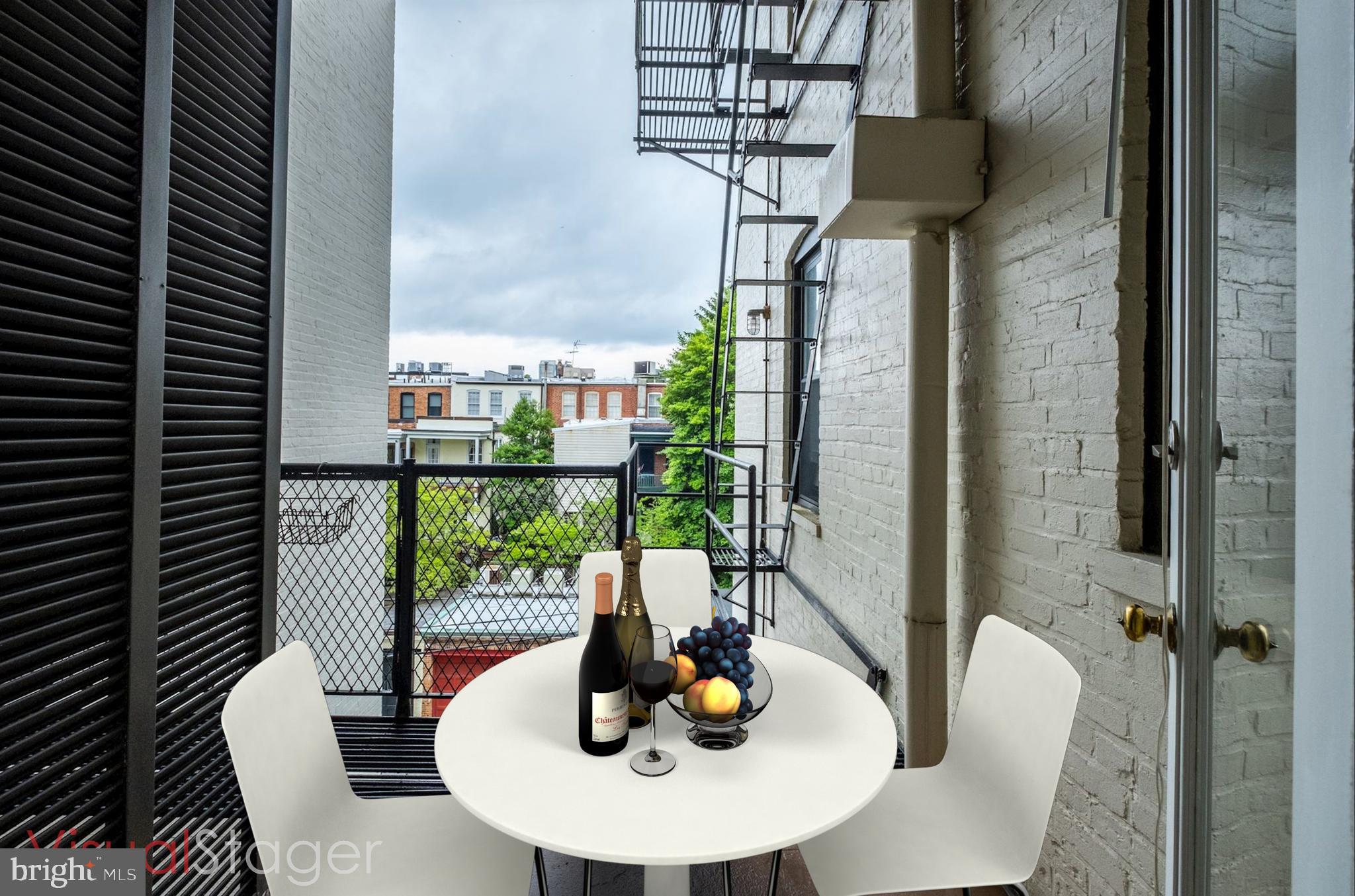 2153 California Street Northwest, Unit 306 Washington, DC 20008 - Photo 22 of 34 a dining room with furniture and wooden floor