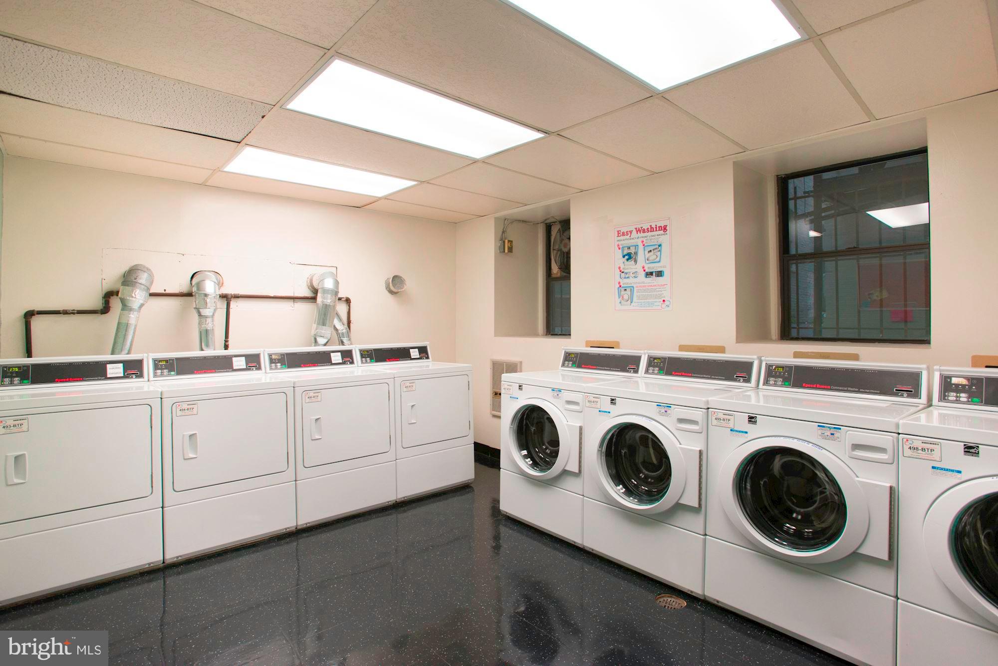 2153 California Street Northwest, Unit 306 Washington, DC 20008 - Photo 27 of 34 a utility room with dryer and washer