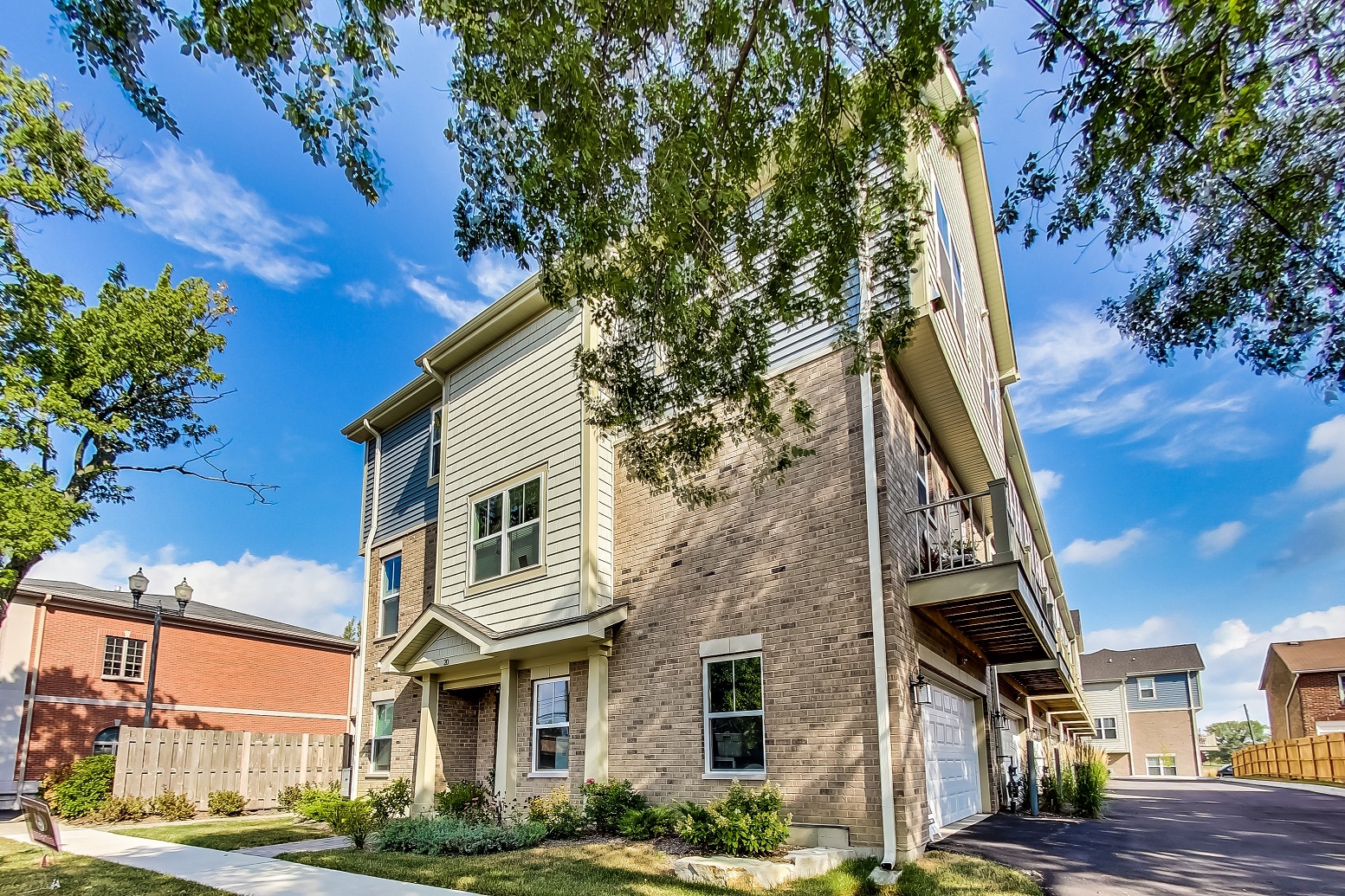 a front view of a multi story residential apartment building