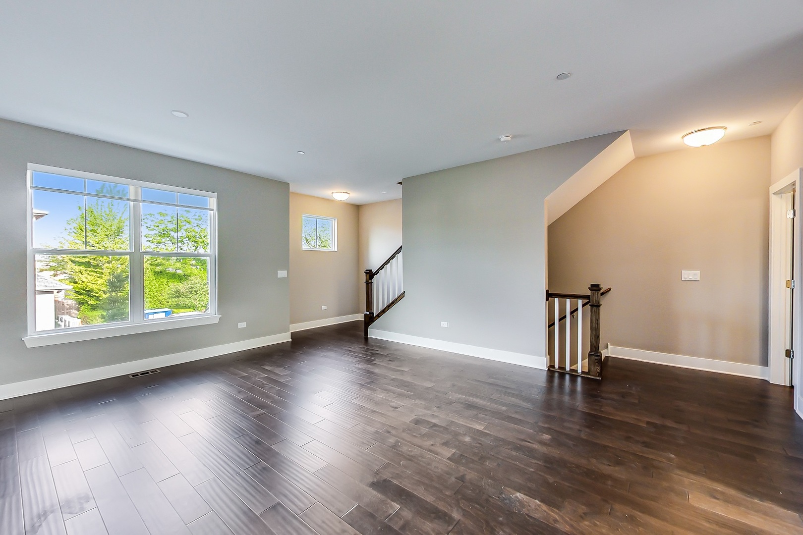 25 Clay Avenue, Unit E Highwood, IL 60040 - Photo 16 of 29 a view of empty room with wooden floor and fan