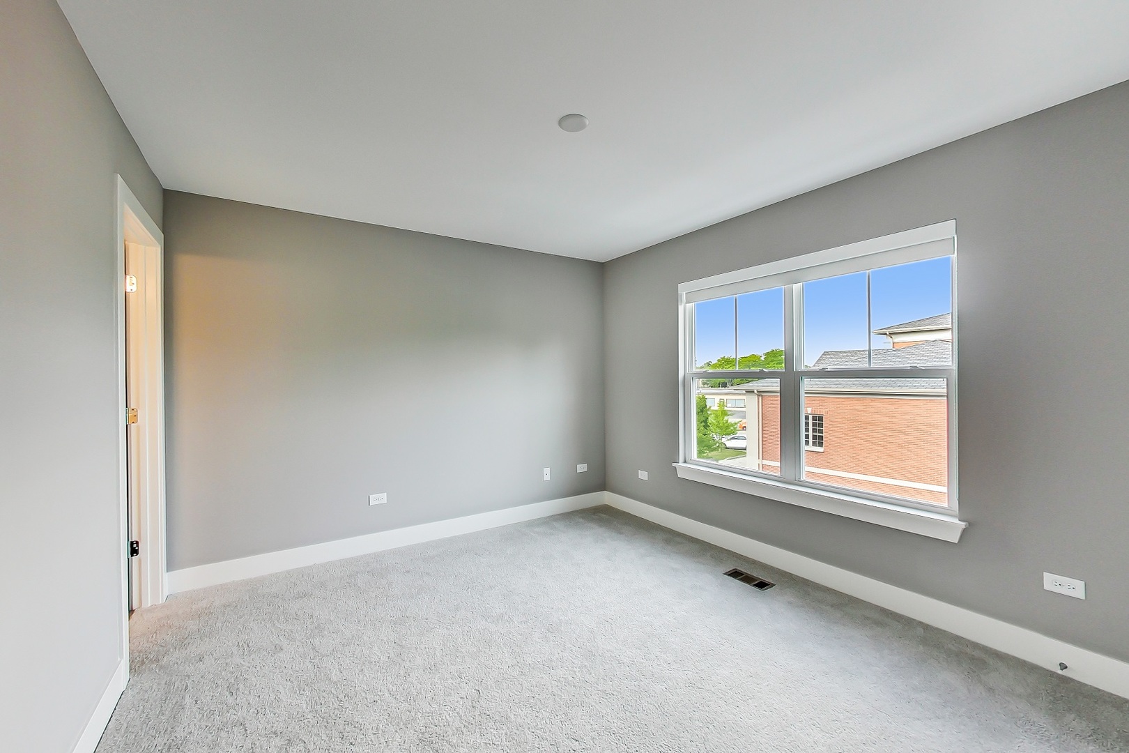 25 Clay Avenue, Unit E Highwood, IL 60040 - Photo 21 of 29 an empty room with a window