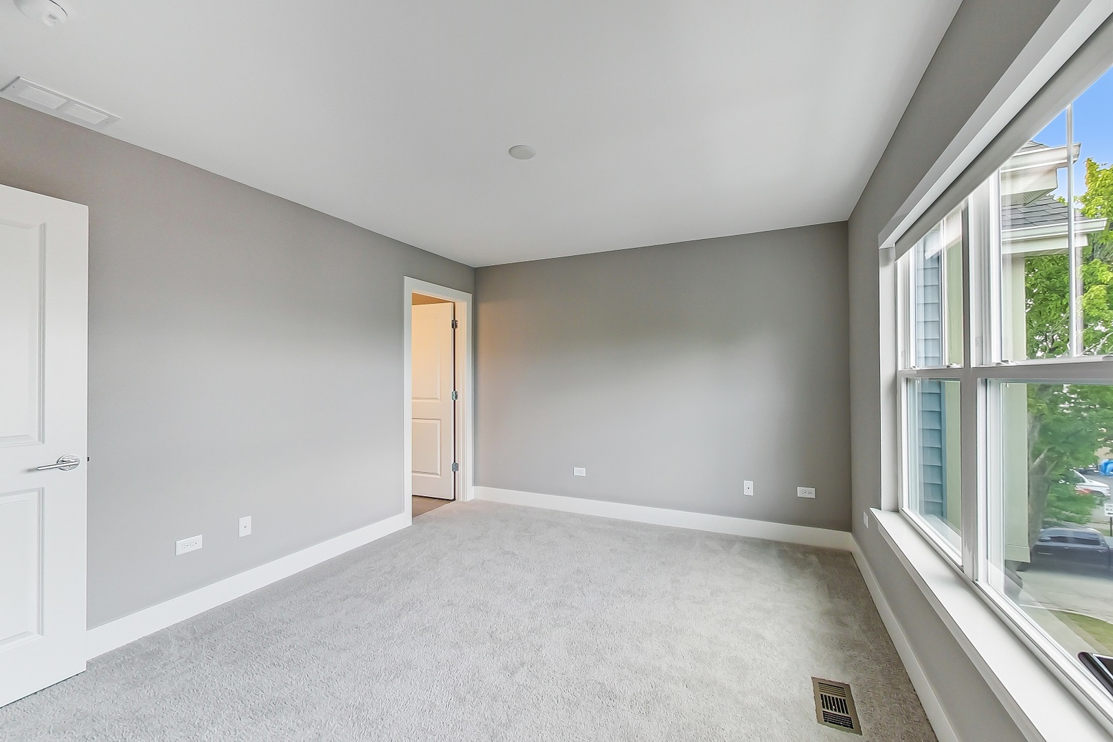 25 Clay Avenue, Unit E Highwood, IL 60040 - Photo 22 of 29 a view of an empty room with a window