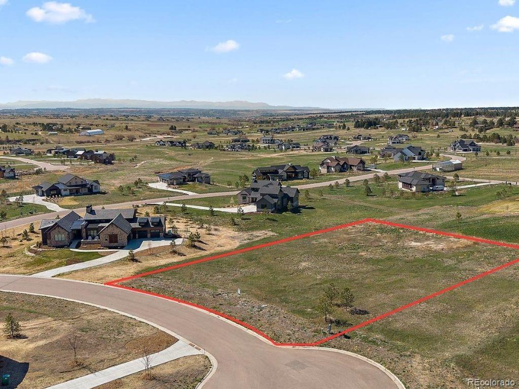 11491 Evening Hunt Road Franktown, CO 80116 - Photo 6 of 10 an aerial view of a city