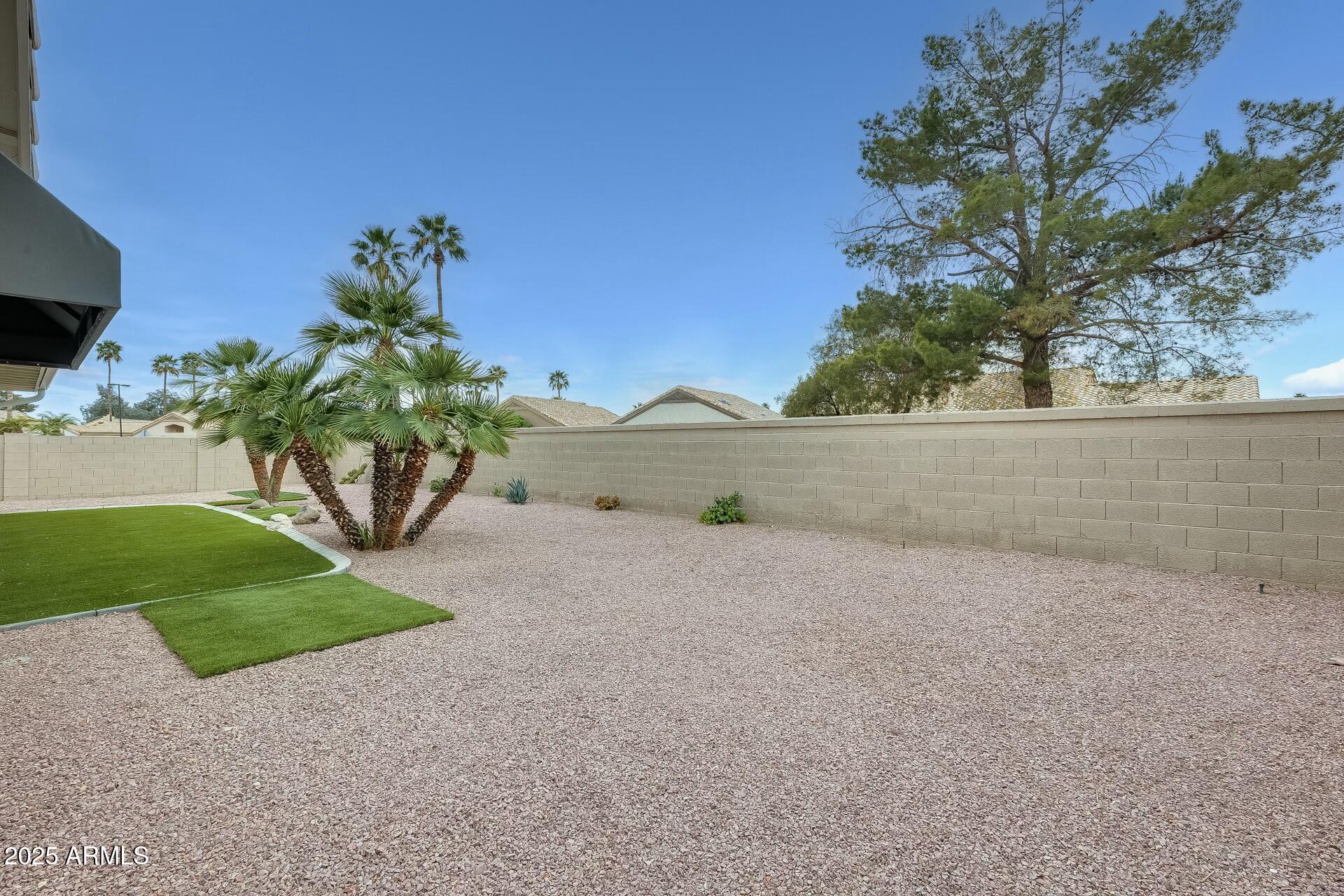 17514 North Rainbow Circle Surprise, AZ 85374 - Photo 41 of 69 front view of a house with a yard