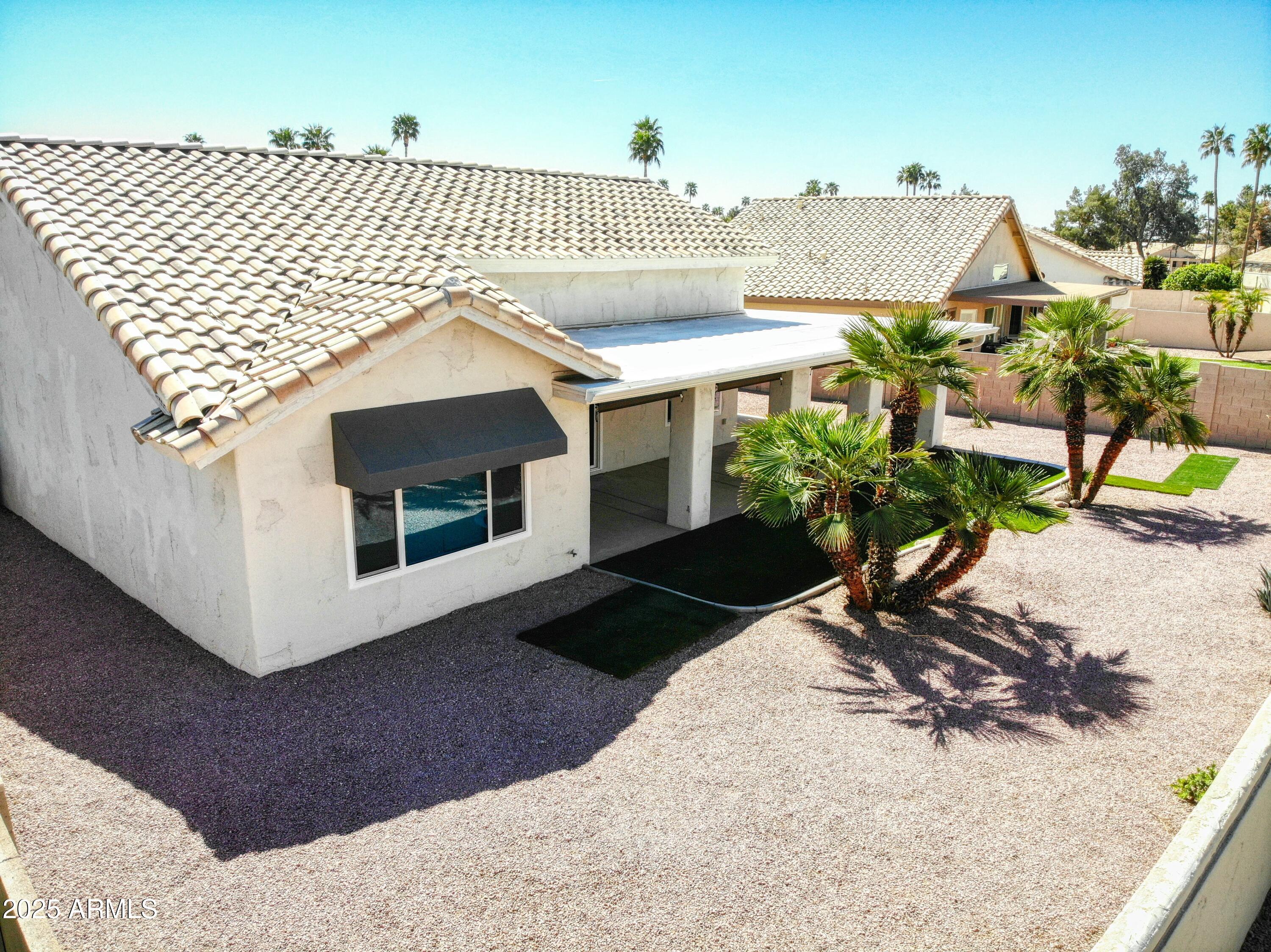 17514 North Rainbow Circle Surprise, AZ 85374 - Photo 43 of 69 a view of a house with backyard and sitting area