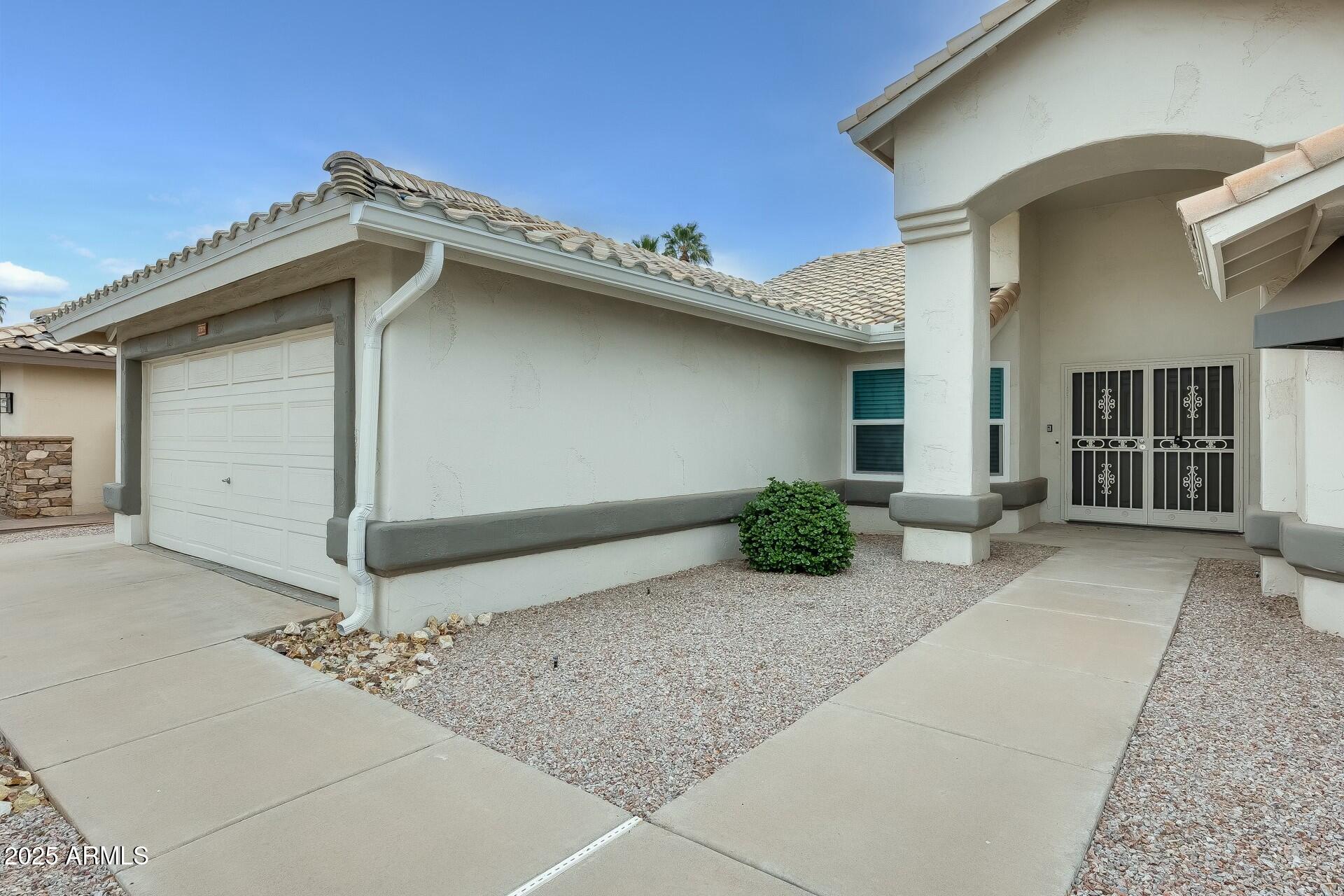 17514 North Rainbow Circle Surprise, AZ 85374 - Photo 45 of 69 a view of a house with basketball court