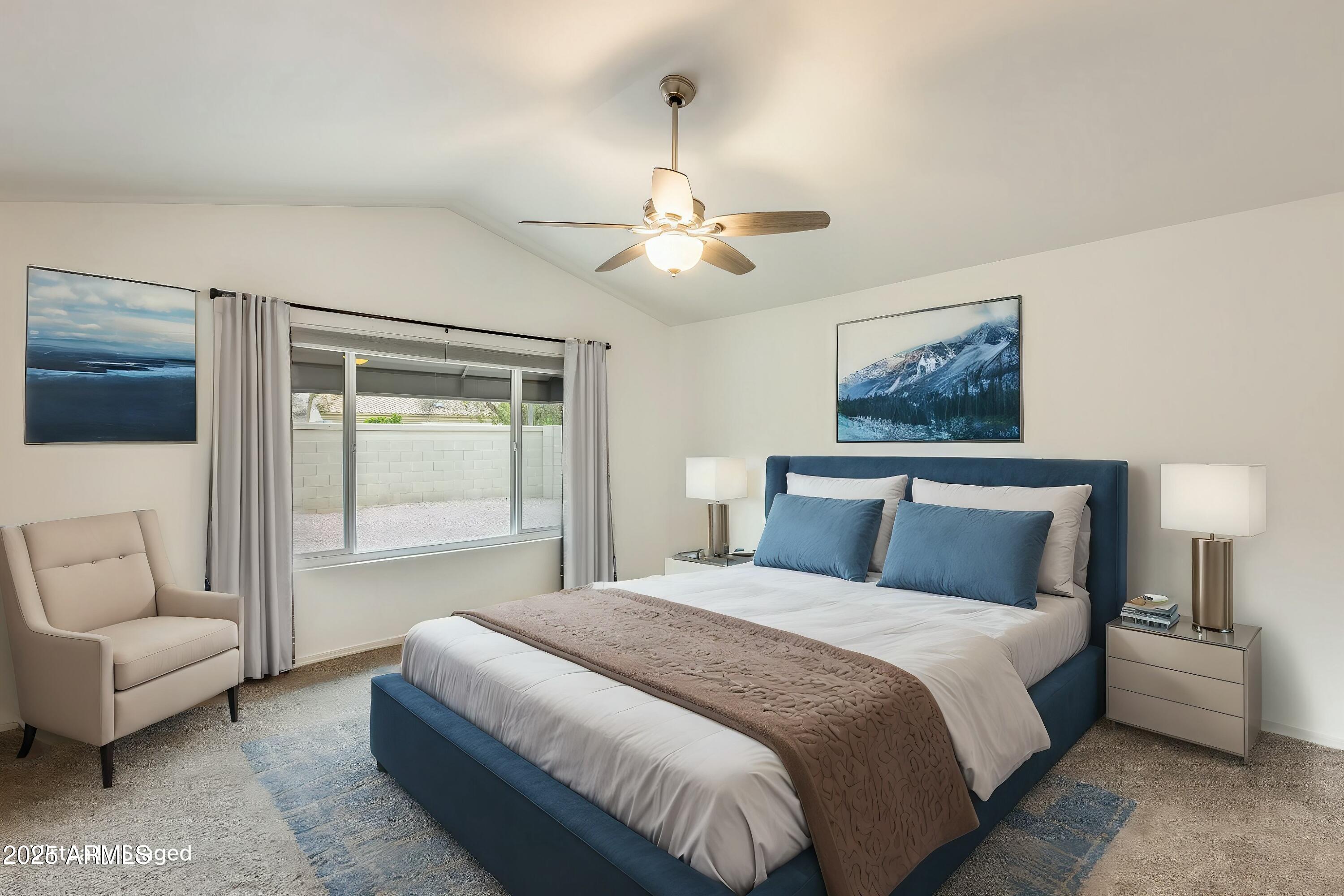 17514 North Rainbow Circle Surprise, AZ 85374 - Photo 7 of 69 a bedroom with a large bed couch and a window