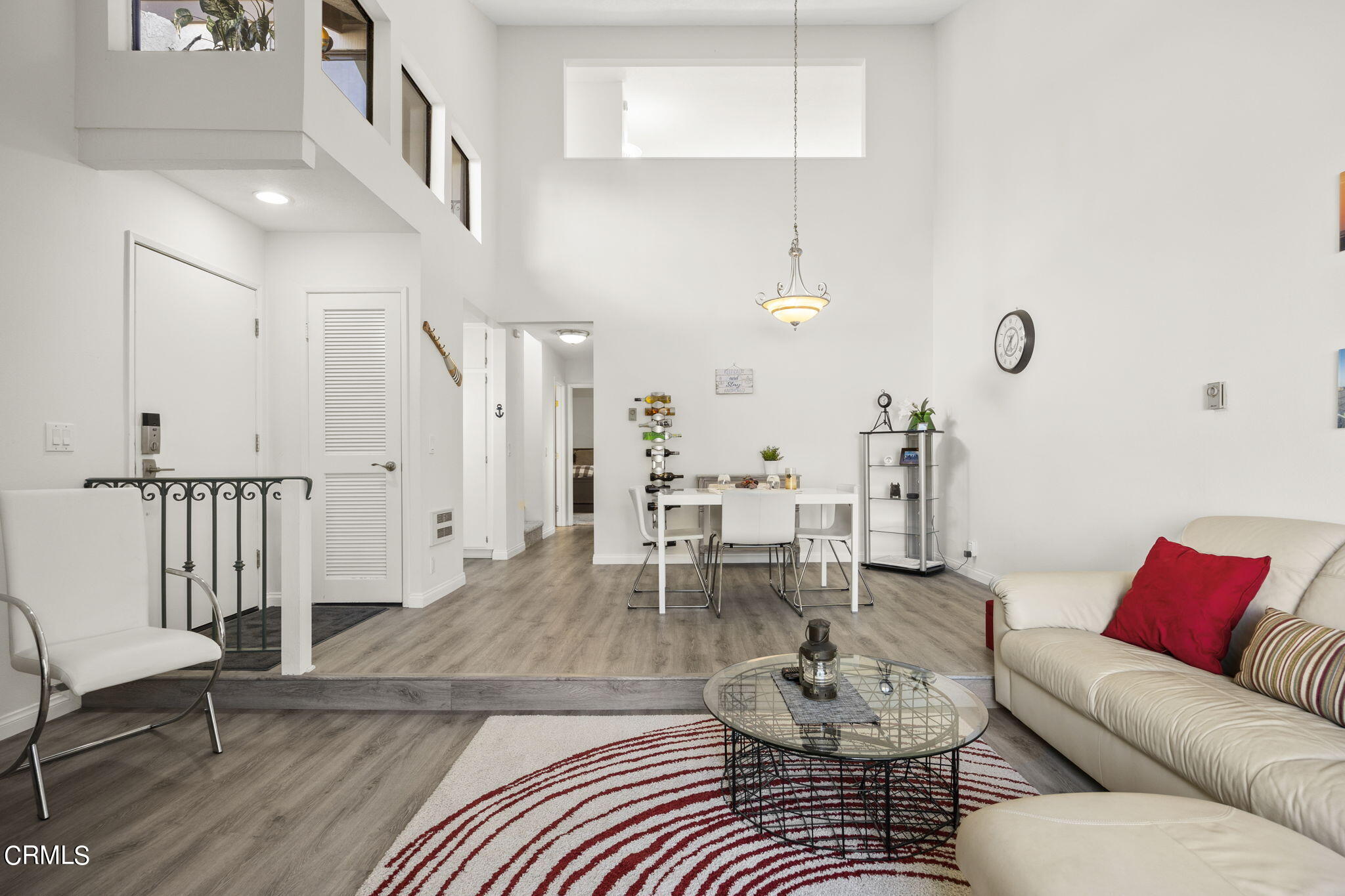 3140 Sunset Lane Oxnard, CA 93035 - Photo 11 of 45 a living room with furniture and a wooden floor