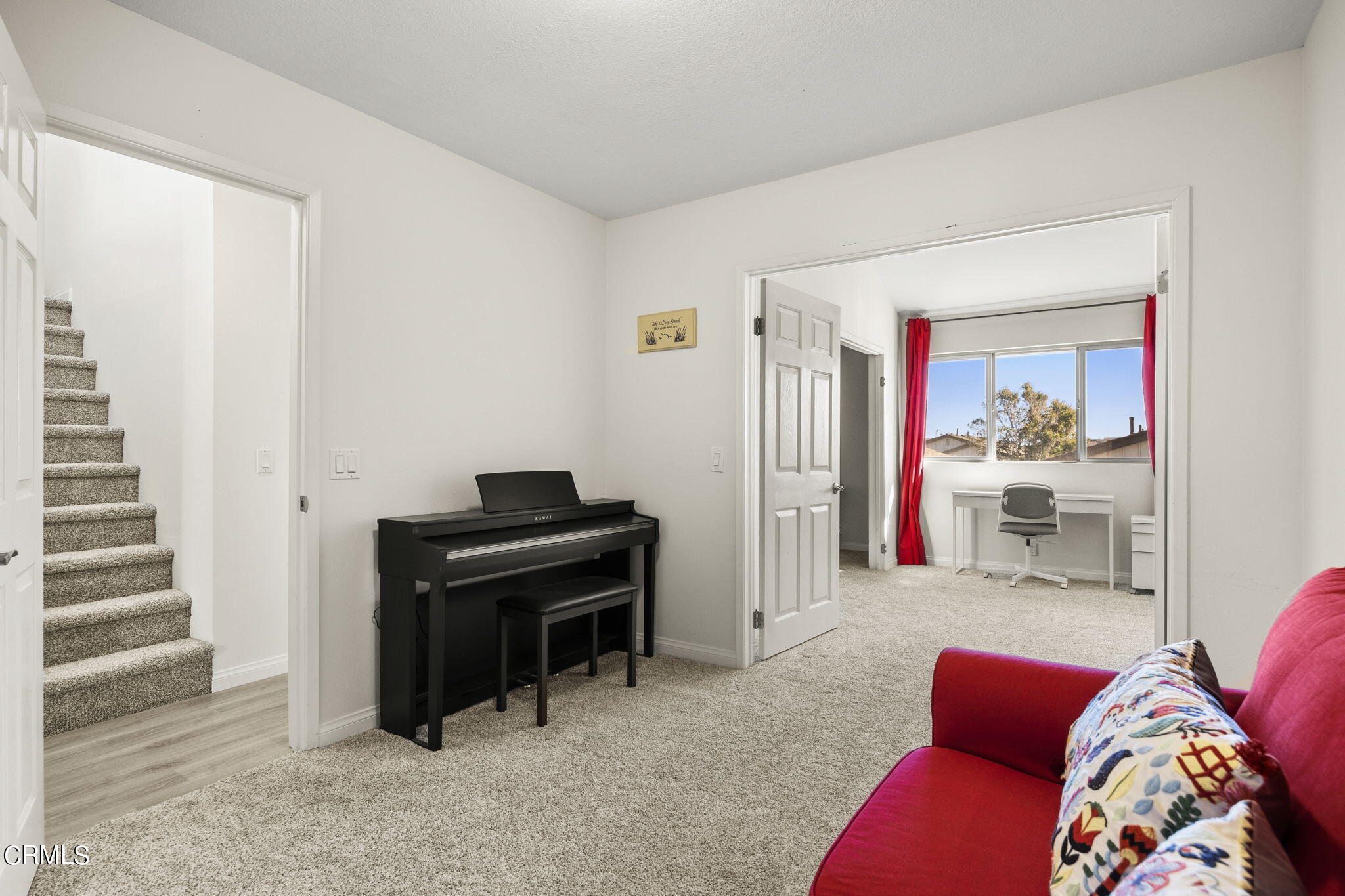 3140 Sunset Lane Oxnard, CA 93035 - Photo 19 of 45 a livingroom with a couch and a workspace