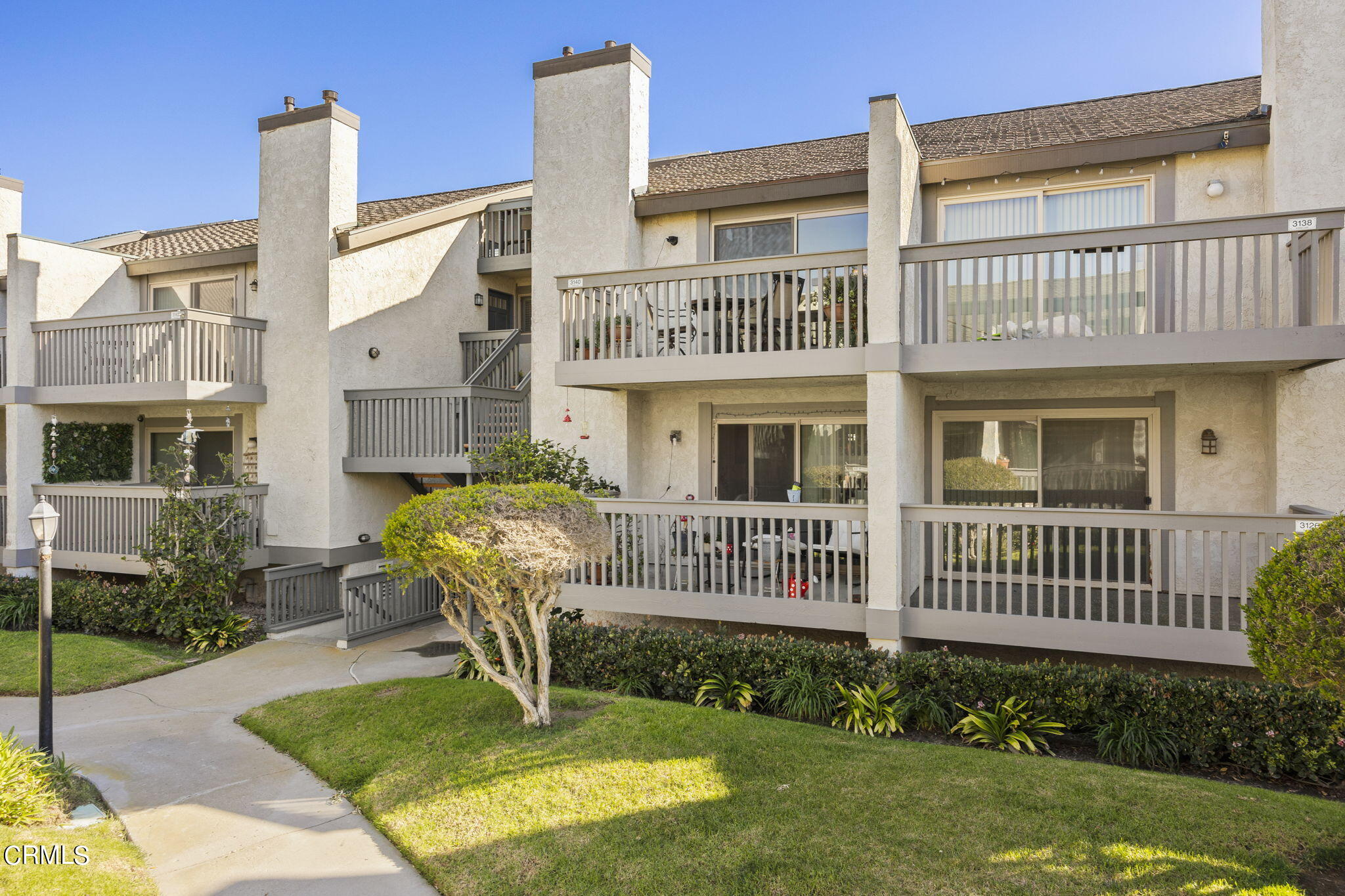 3140 Sunset Lane Oxnard, CA 93035 - Photo 3 of 45 a front view of a house with garden
