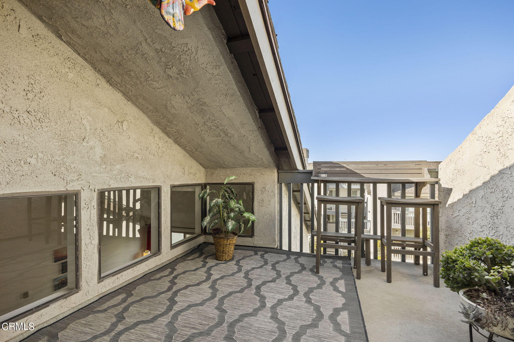 3140 Sunset Lane Oxnard, CA 93035 - Photo 32 of 45 a view of a chairs and table in the balcony