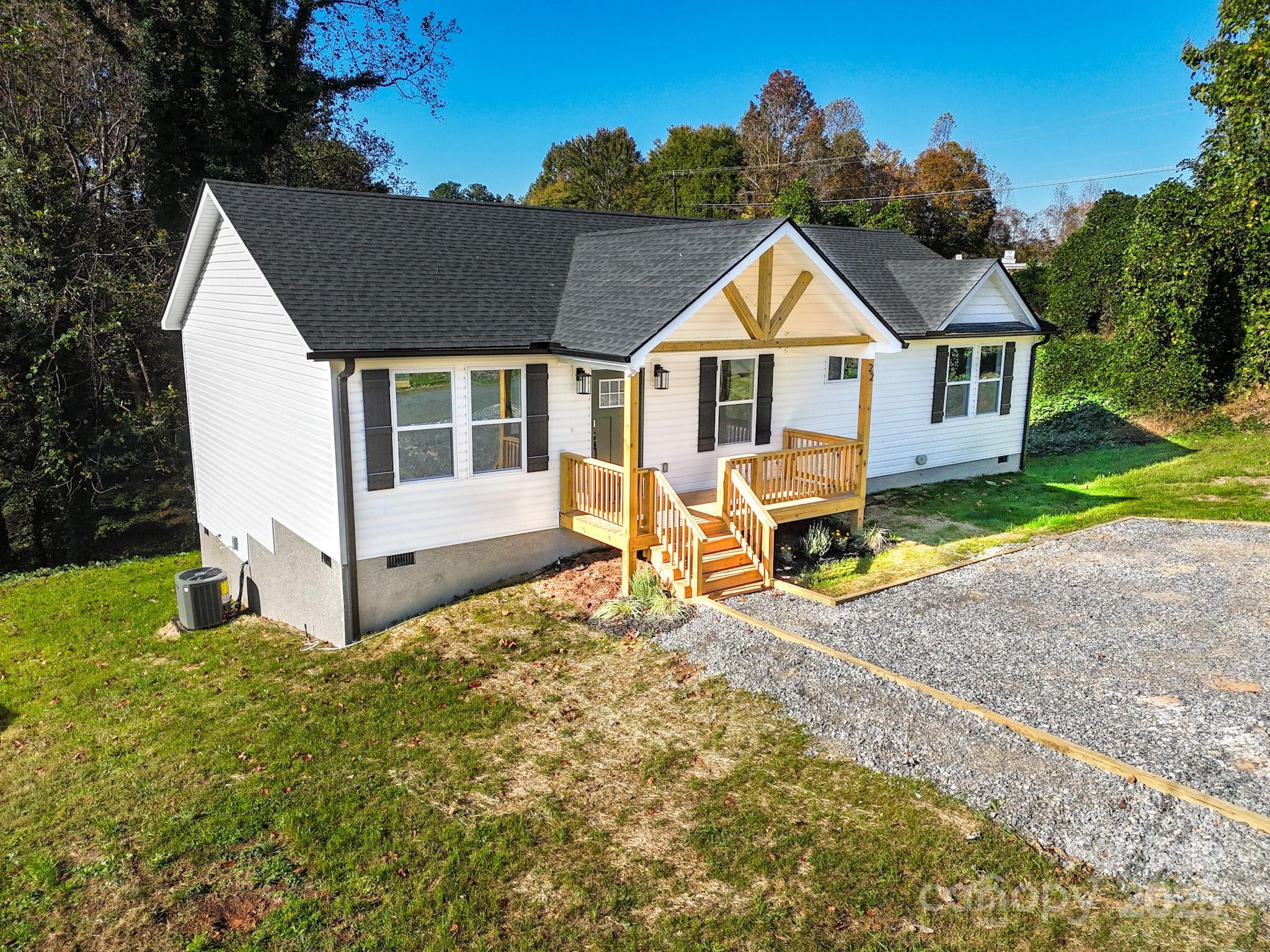 22 Hoyle Street Marion, NC 28752 - Photo 37 of 43 a house view with a garden space