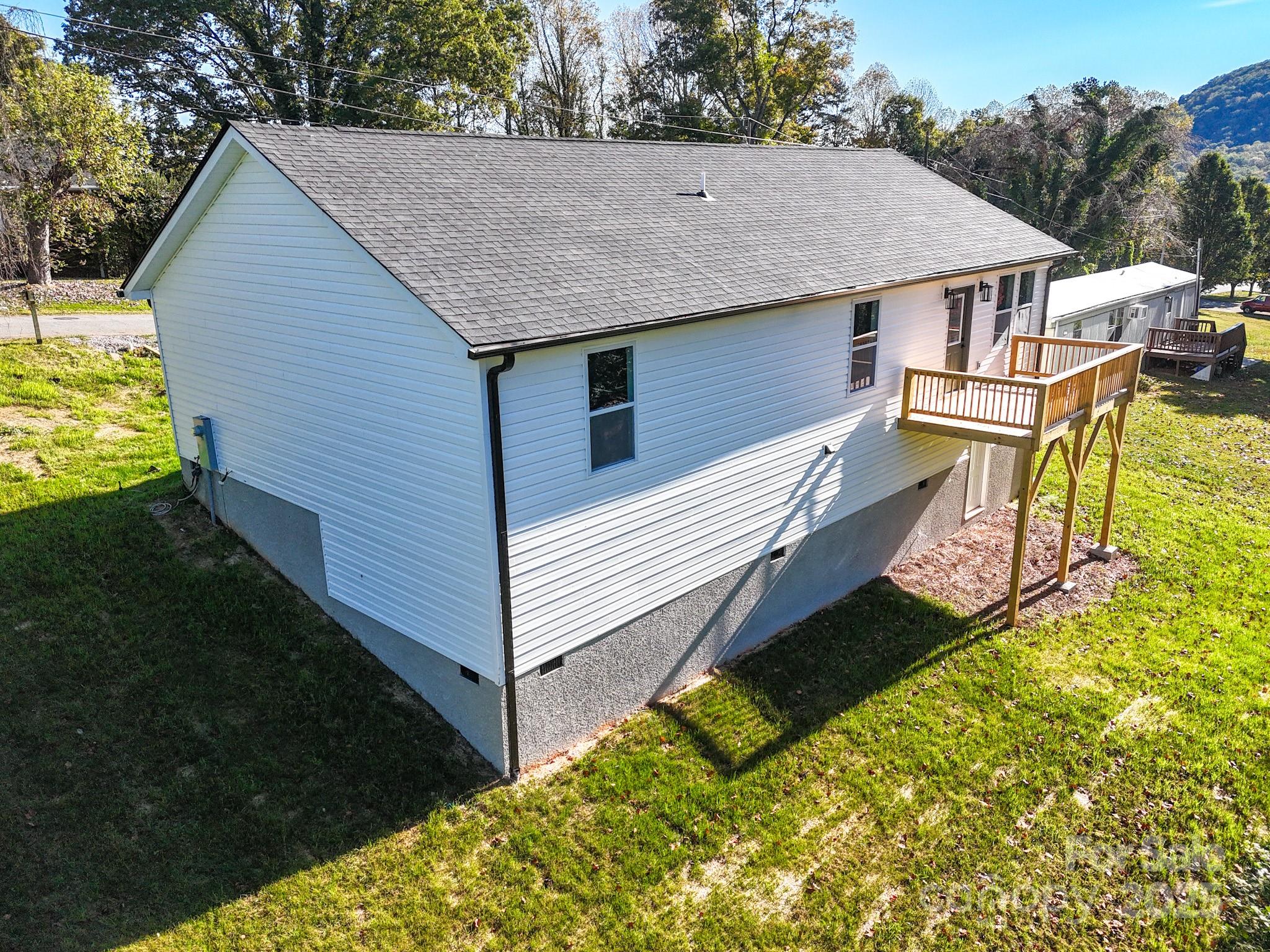22 Hoyle Street Marion, NC 28752 - Photo 39 of 43 a aerial view of a house with a yard