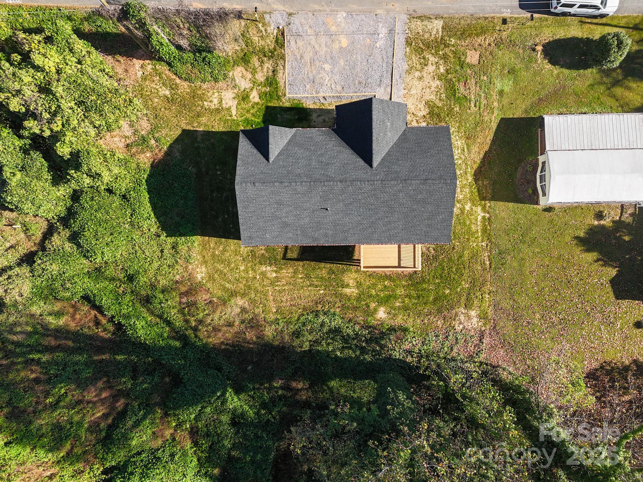 22 Hoyle Street Marion, NC 28752 - Photo 7 of 43 a aerial view of a house with a yard