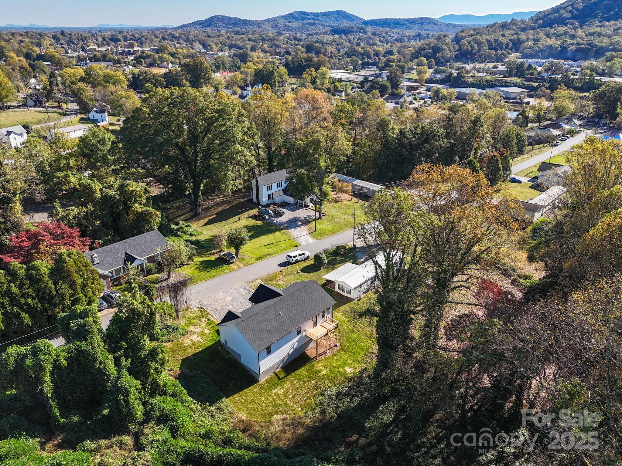 22 Hoyle Street Marion, NC 28752 - Photo 8 of 43 an aerial view of residential houses with outdoor space