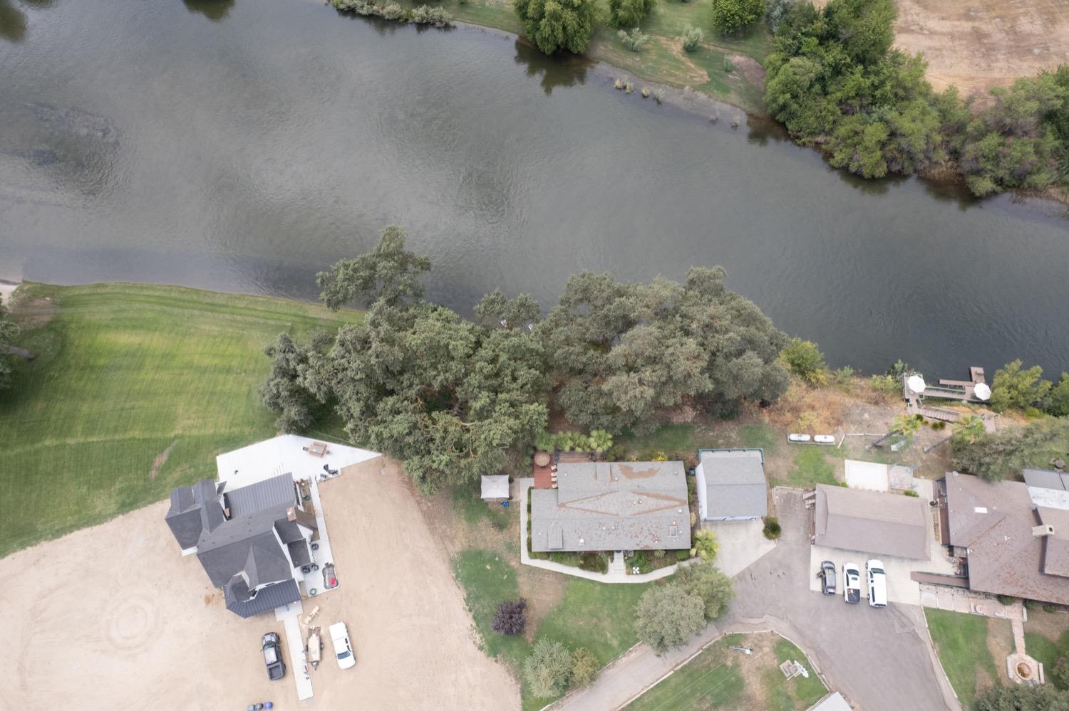 41261B Road 40 Reedley, CA 93654 - Photo 9 of 46 The home for sale is located east of the Trees shown in the photo.