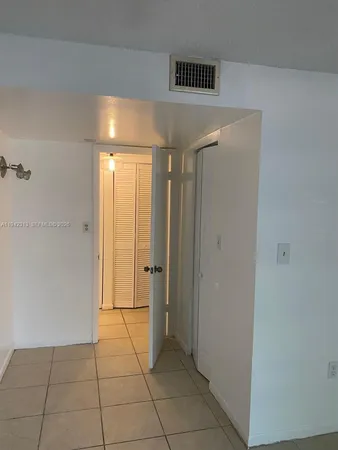 a view of a room with a window