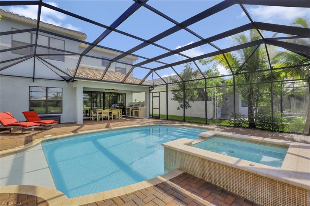 4334 Aurora Street Naples, FL 34119 - Photo 22 of 31 a view of indoor pool and sitting area