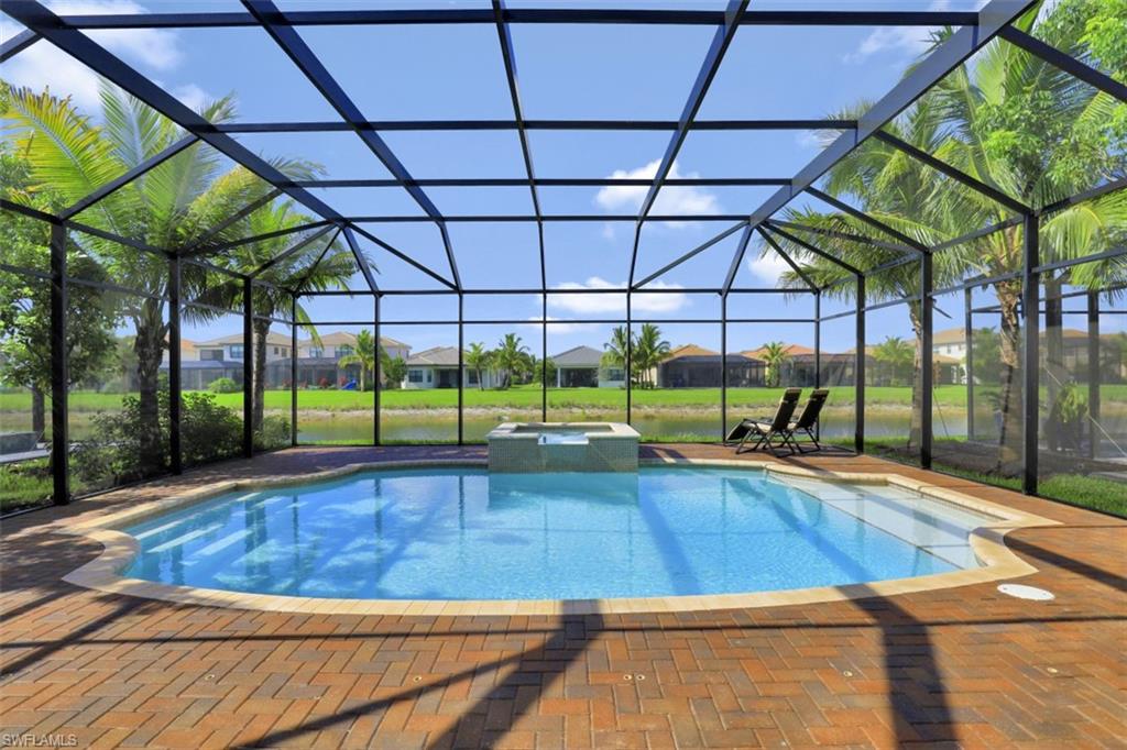 4334 Aurora Street Naples, FL 34119 - Photo 26 of 31 a view of yard