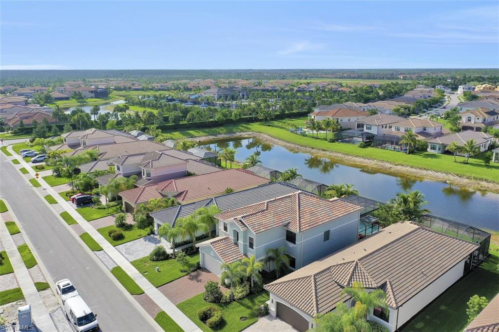 4334 Aurora Street Naples, FL 34119 - Photo 29 of 31 an aerial view of a house with a garden