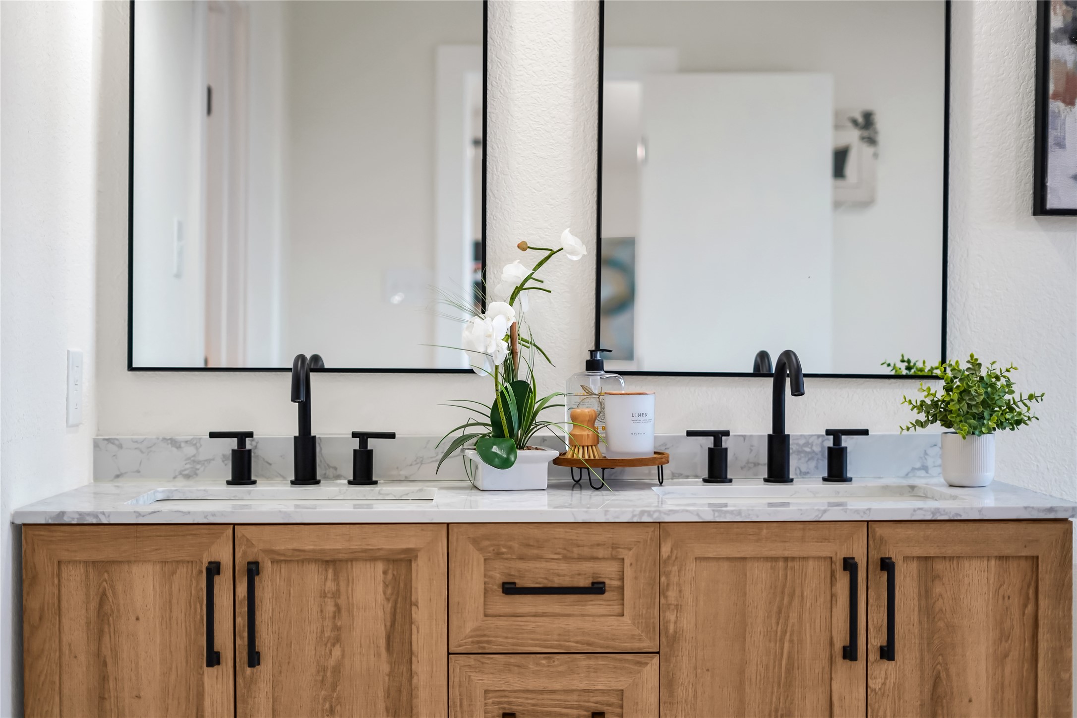 8921 Norwich Castle Austin, TX 78747 - Photo 21 of 33 a close view of sink and mirror