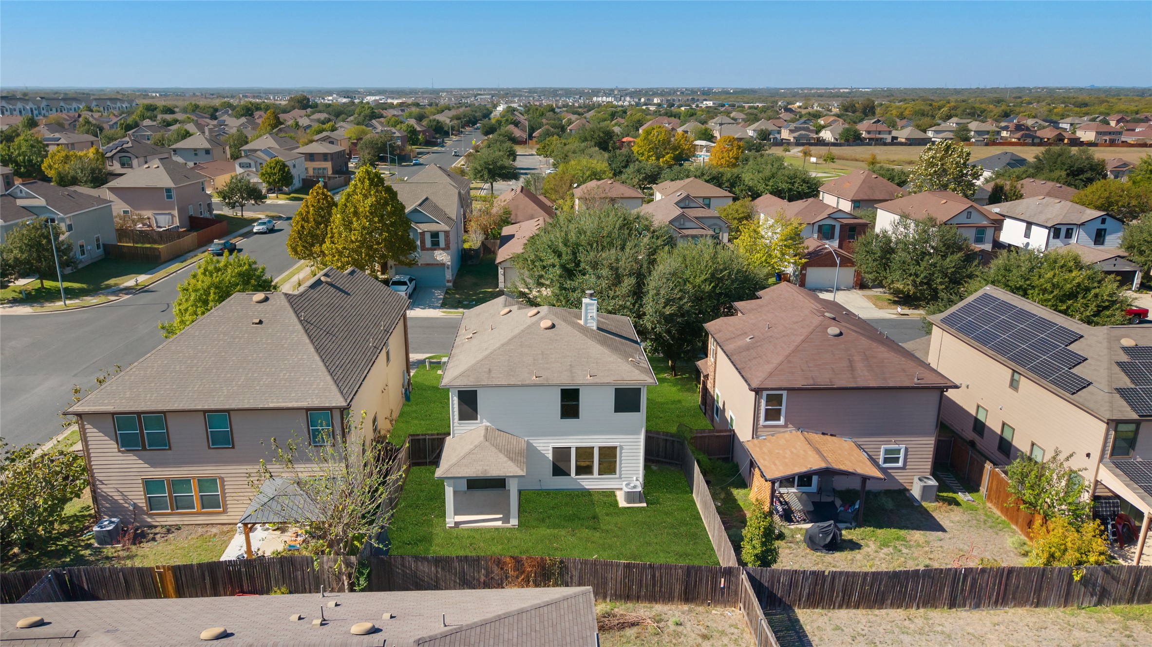 8921 Norwich Castle Austin, TX 78747 - Photo 27 of 33 an aerial view of multiple houses with a yard