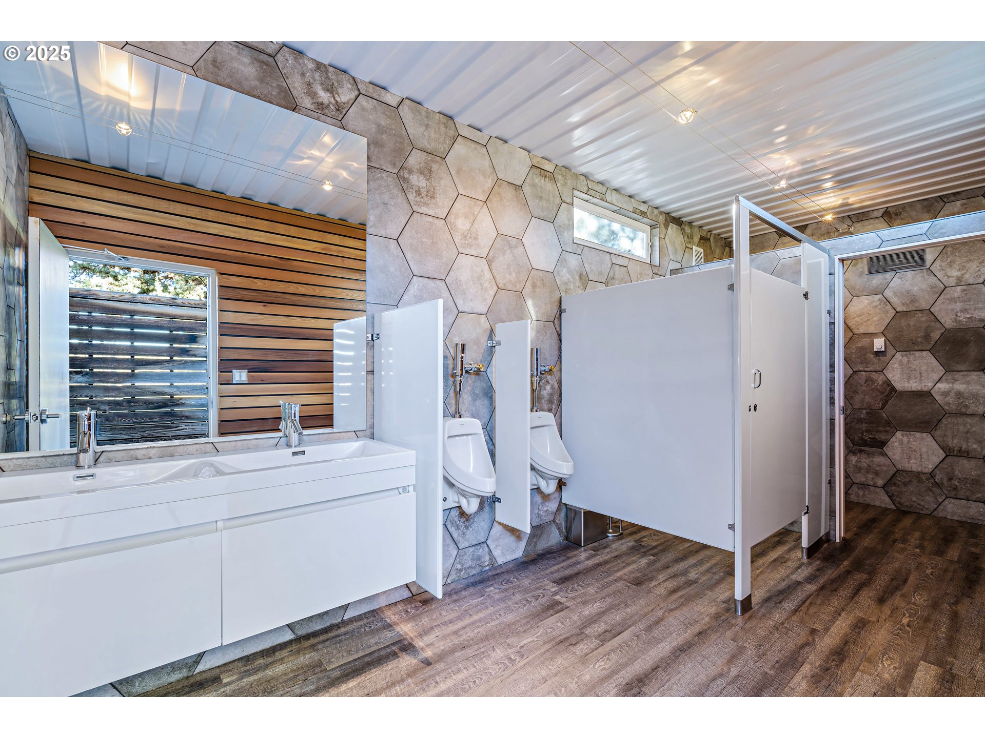 62265 Dodds Road Bend, OR 97701 - Photo 14 of 47 a view of a hallway with washer and dryer