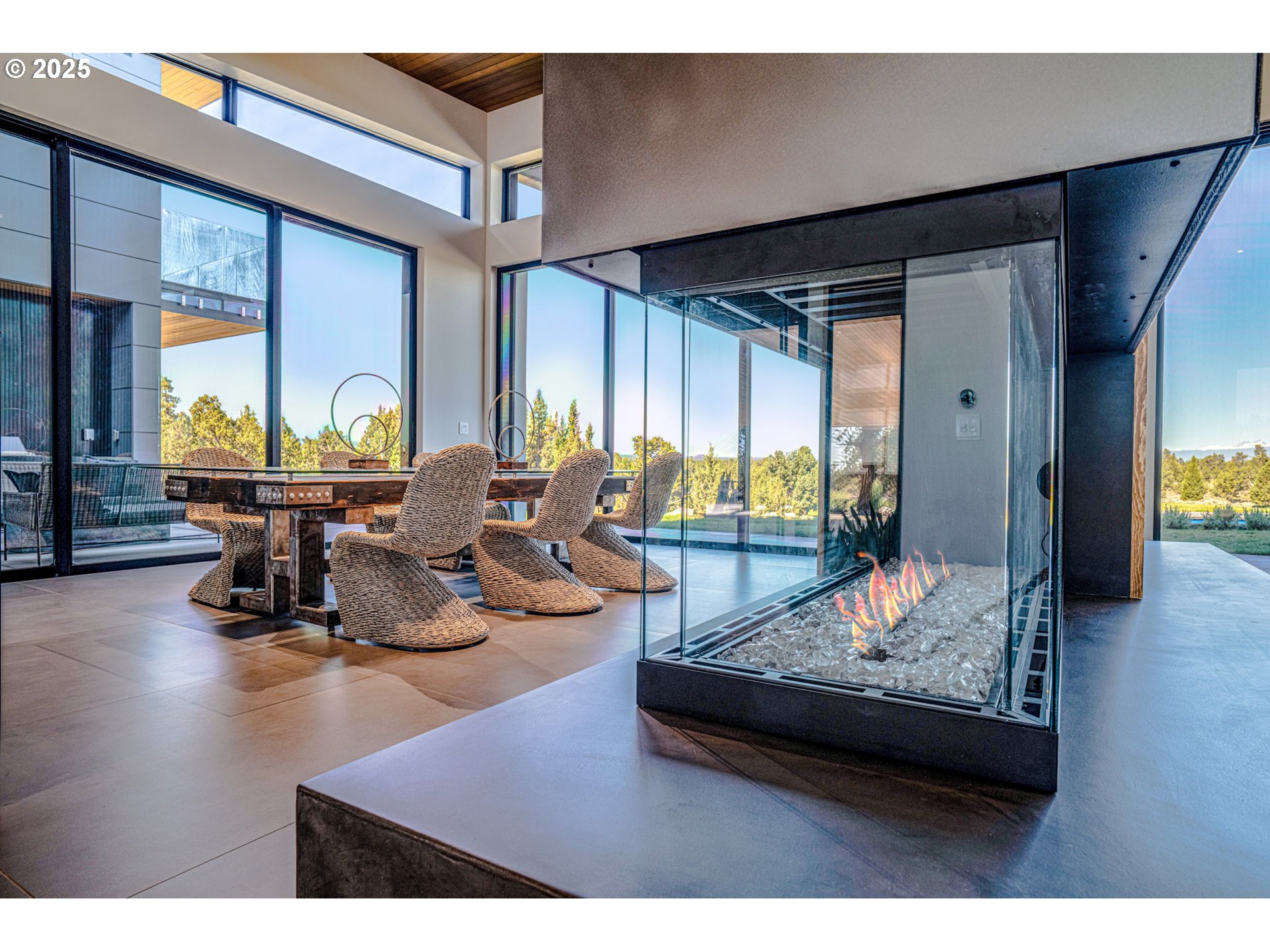 62265 Dodds Road Bend, OR 97701 - Photo 18 of 47 a living room with furniture and a large window