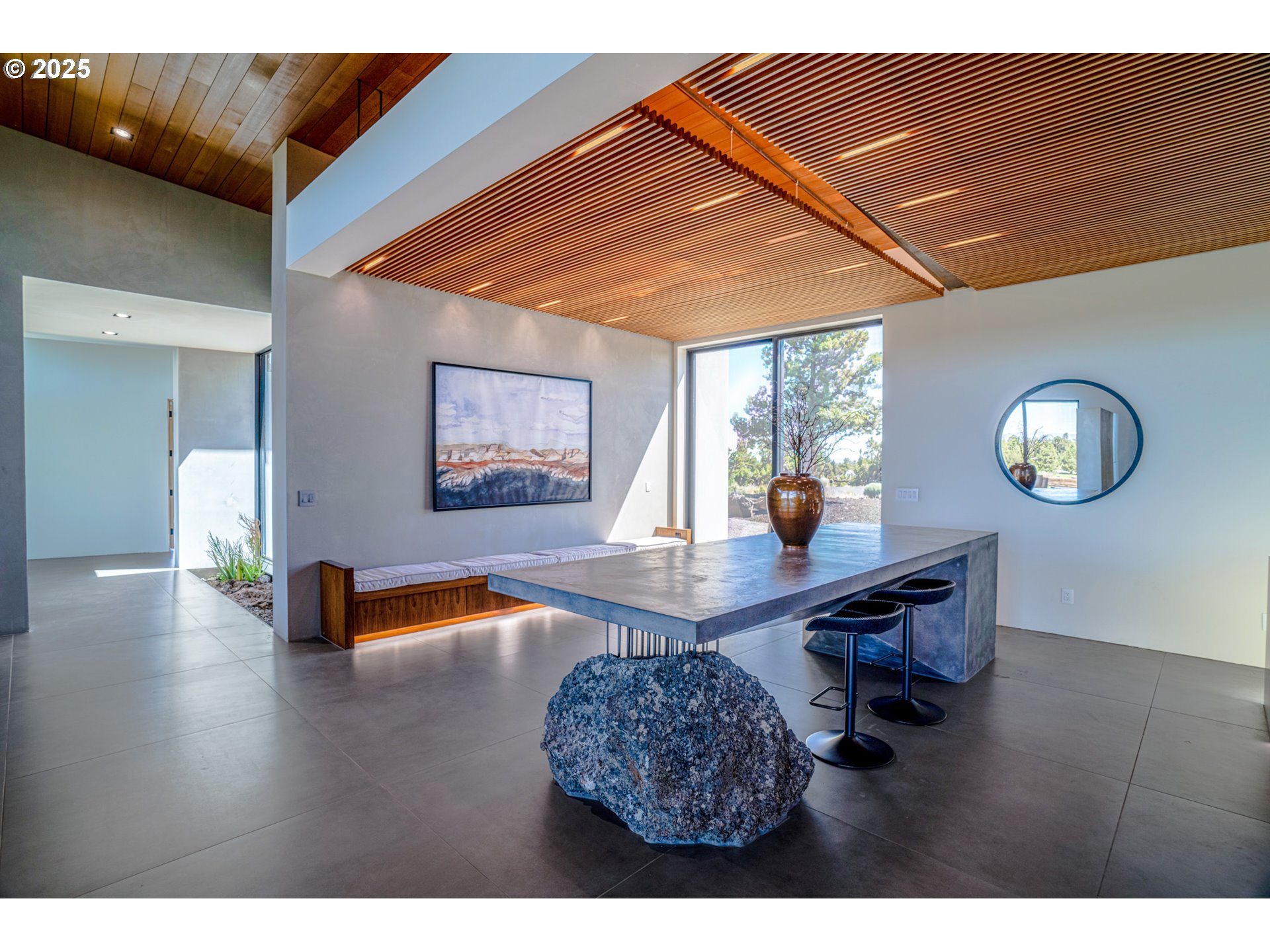 62265 Dodds Road Bend, OR 97701 - Photo 29 of 47 a living room with furniture and a wooden floor