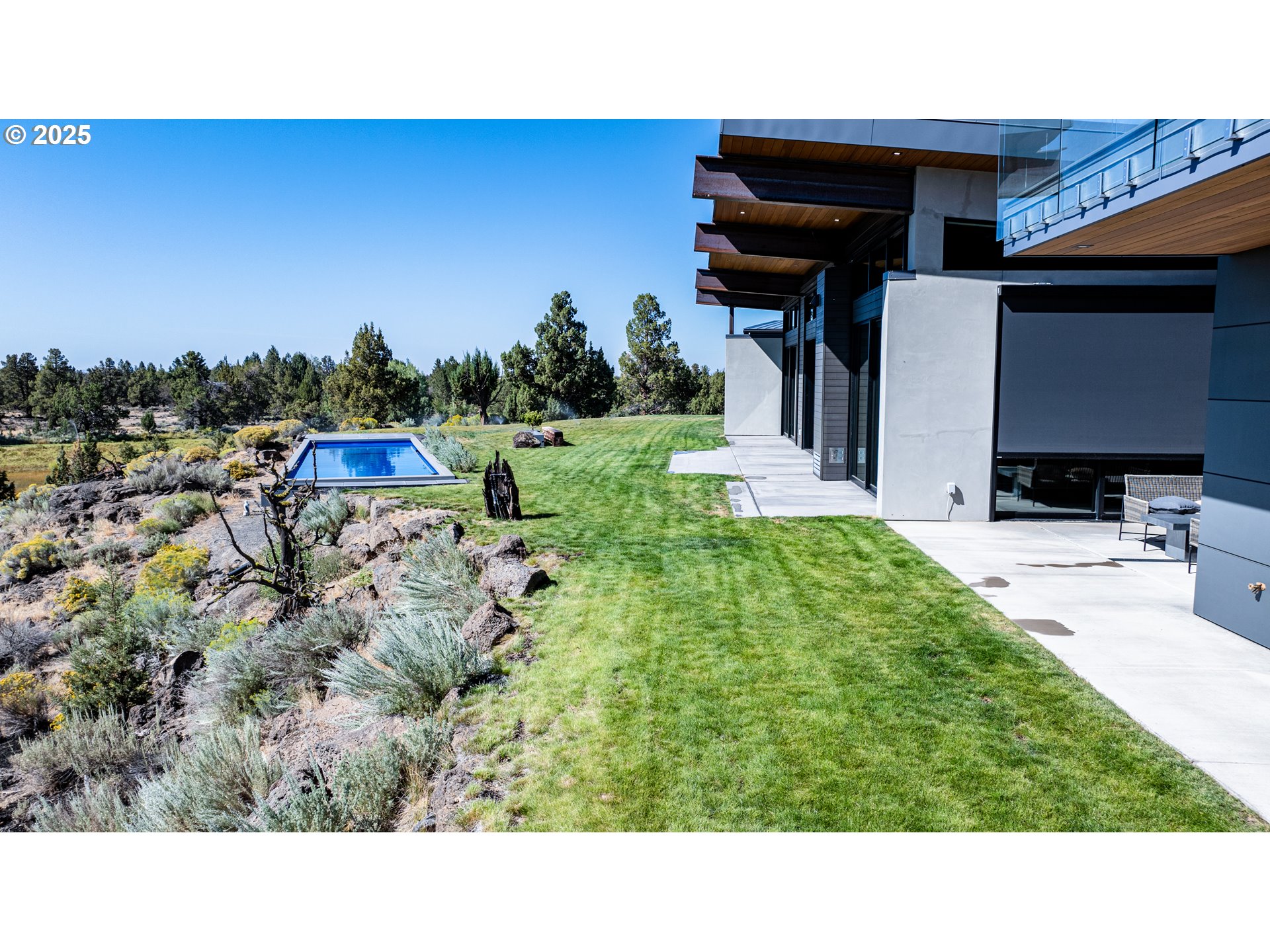 62265 Dodds Road Bend, OR 97701 - Photo 3 of 47 a black and white photo of a house