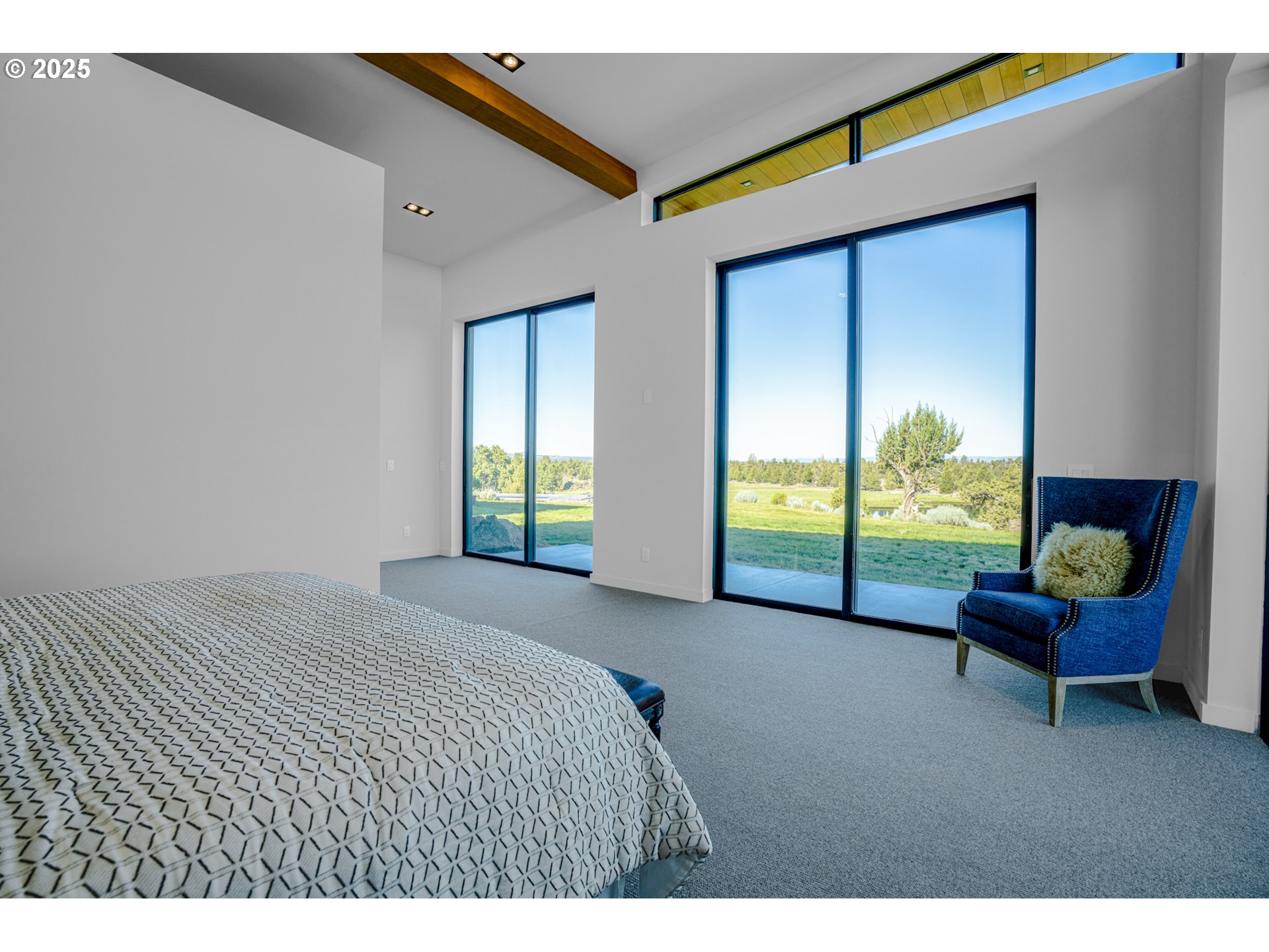 62265 Dodds Road Bend, OR 97701 - Photo 38 of 47 a bedroom with furniture and a window