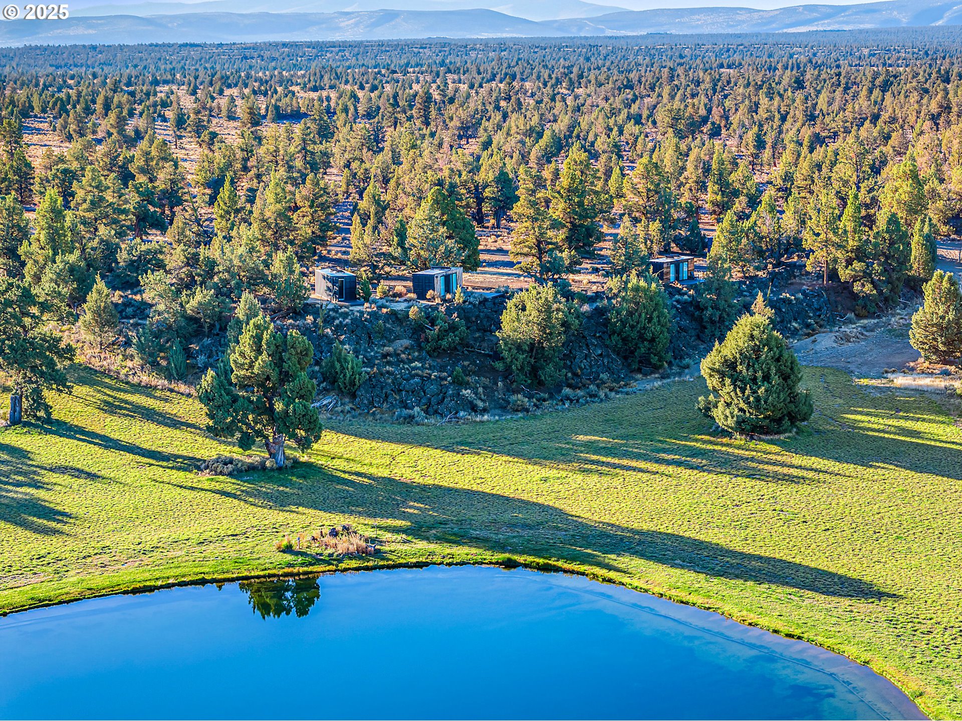 62265 Dodds Road Bend, OR 97701 - Photo 45 of 47 a view of swimming pool with an outdoor space and seating area