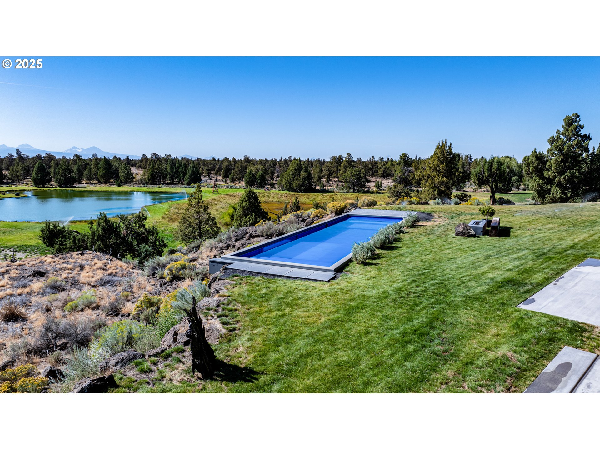 62265 Dodds Road Bend, OR 97701 - Photo 47 of 47 a view of swimming pool and lake view