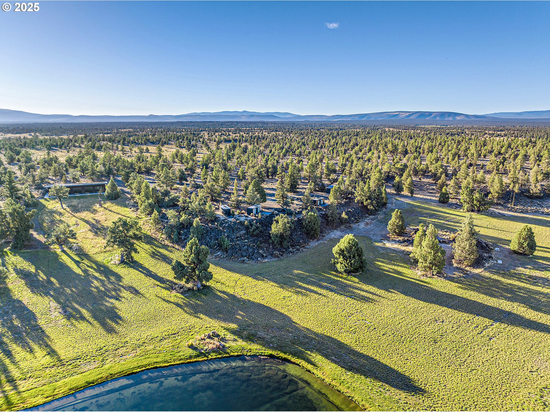 62265 Dodds Road Bend, OR 97701 - Photo 6 of 47 a room with lots of furniture and garden view