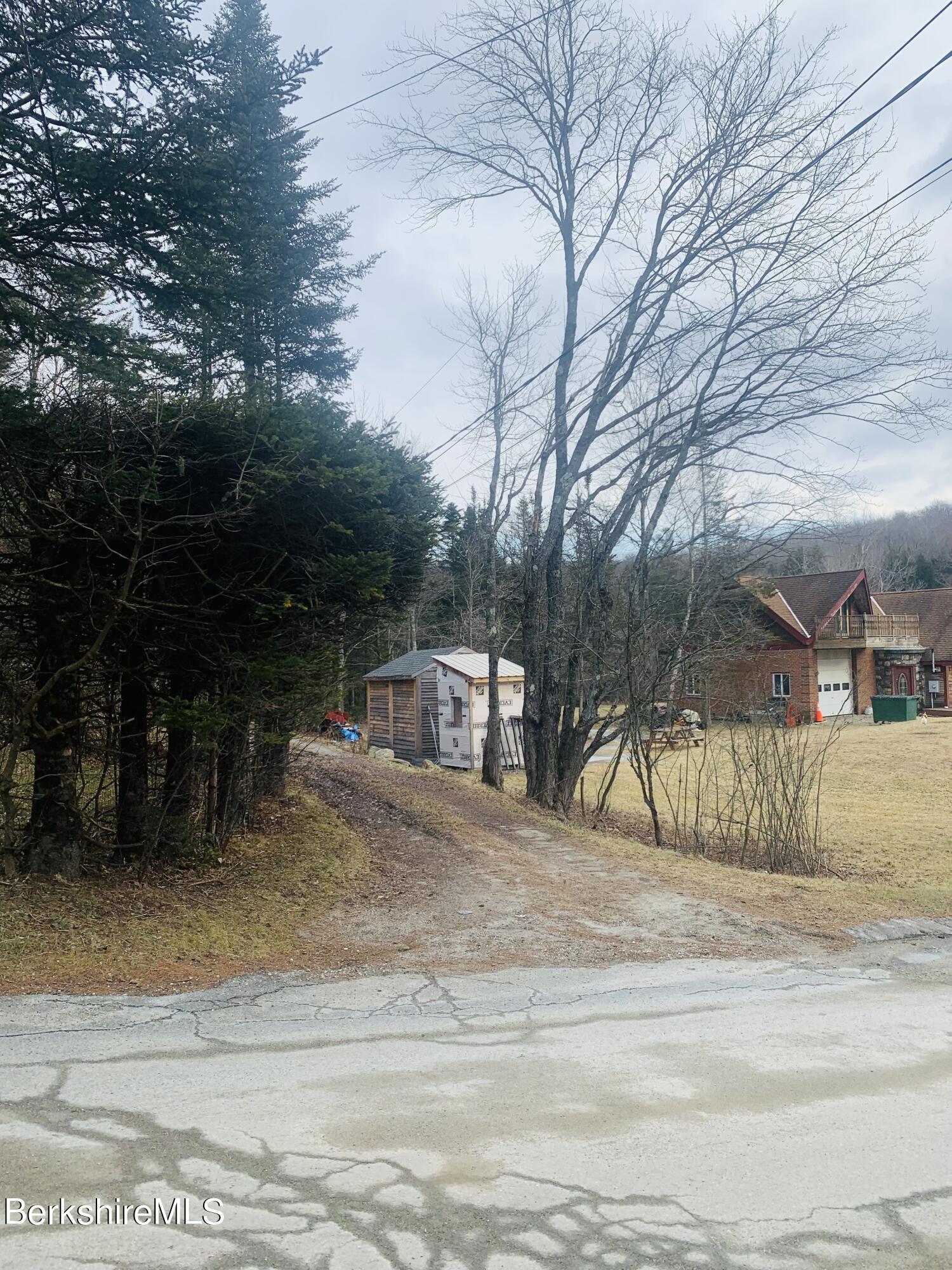 45 Access Road 3 Road, Unit 3 Plainfield, MA 01070 - Photo 3 of 5 a view of a house with a yard