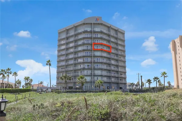 a view of a tall building next to a building