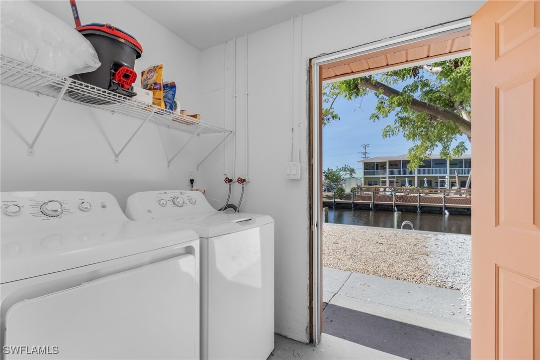 3201-3203 Stabile Road St. James City, FL 33956 - Photo 14 of 34 a view of storage and utility room